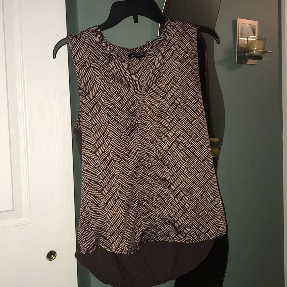 Brown and cream blouse.